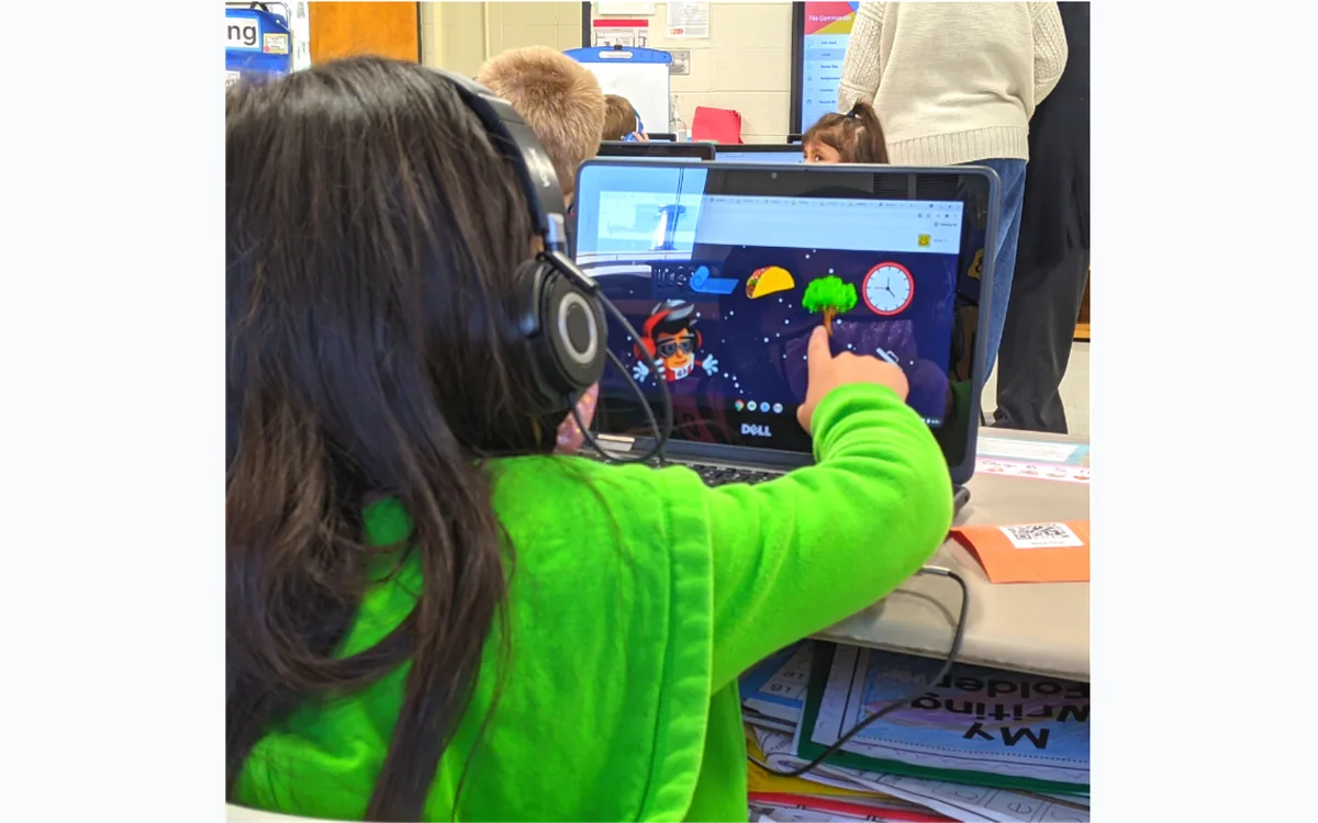 A student using Lyrics2Learn self-paced reading practice