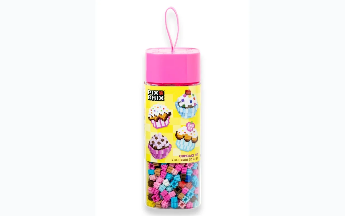 Pix Brix cupcake set packaging with pink lid and colorful cupcakes on a yellow background