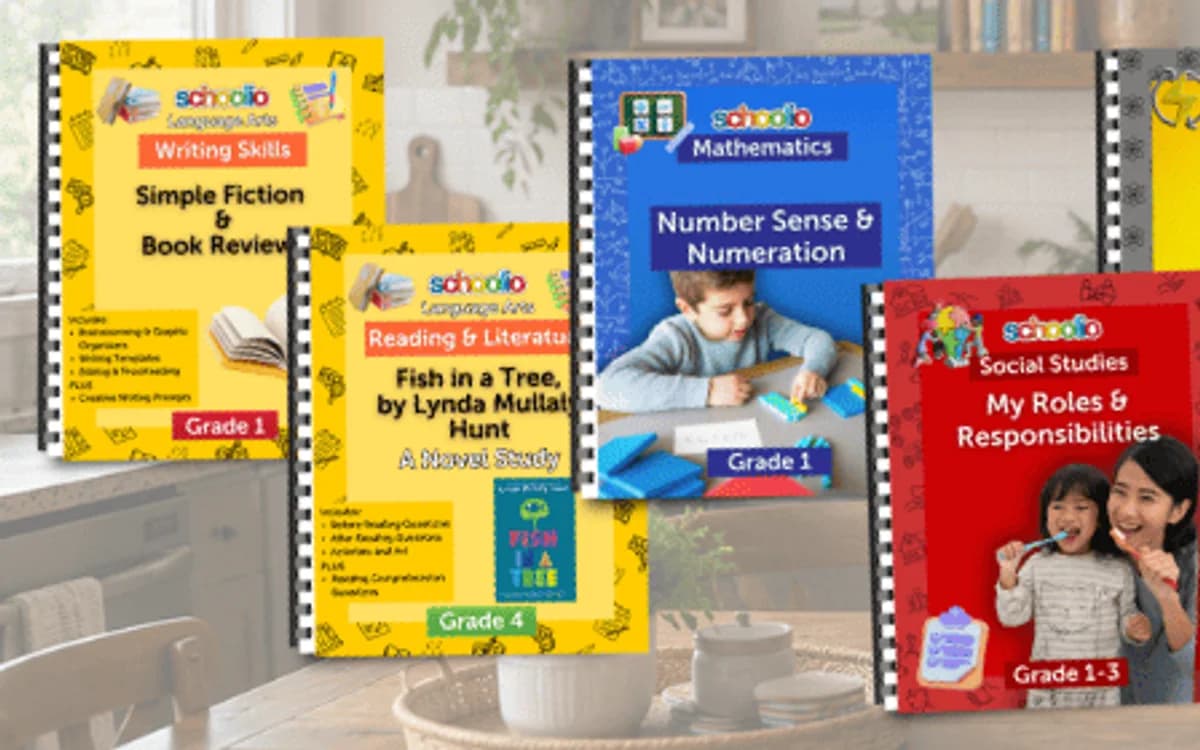 Collection of Schoolio curriculum workbooks covering Language Arts, Math, Science, and Social Studies
