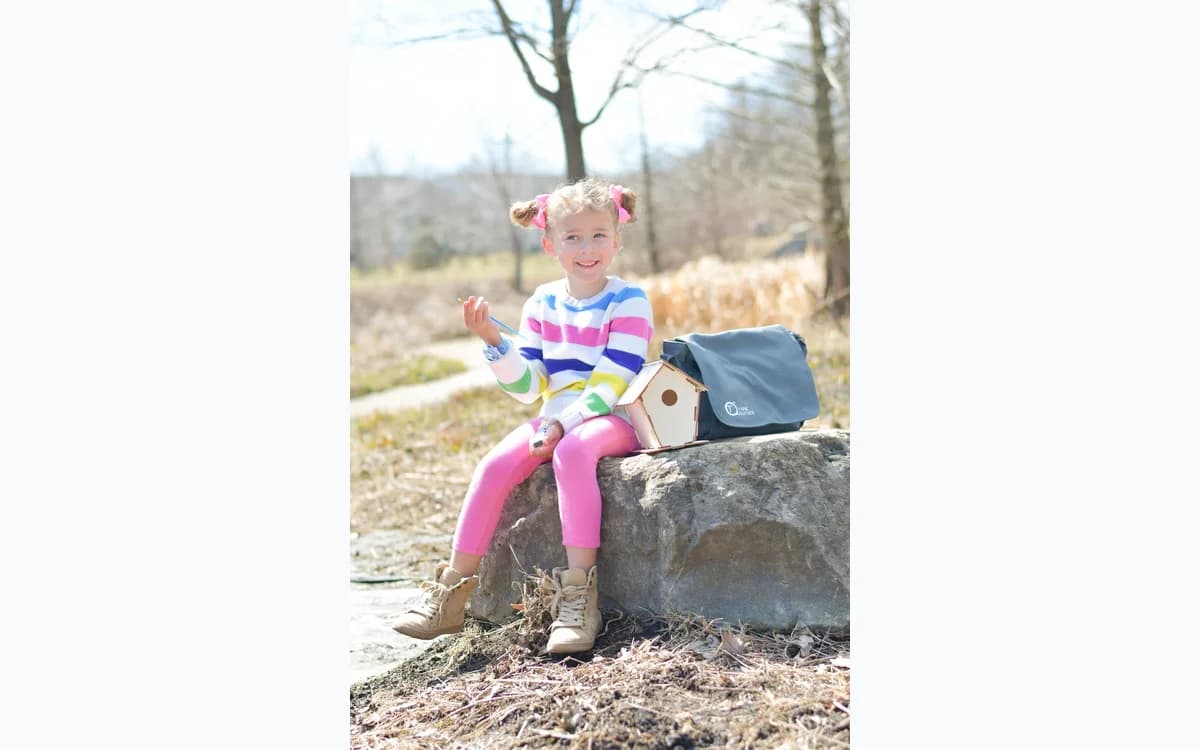 Child using THiNK OUTSiDE for outdoor learning